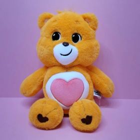 ケアベア アンロック・ザ・マジック 27cm テンダーハート オレンジ色の抱き枕人形 (贈呈品なくなり次第、贈呈終了)