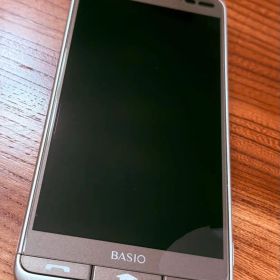 【中古】 京セラ BASIO03 KYV43 au ゴールド 本体のみ 初期化済
